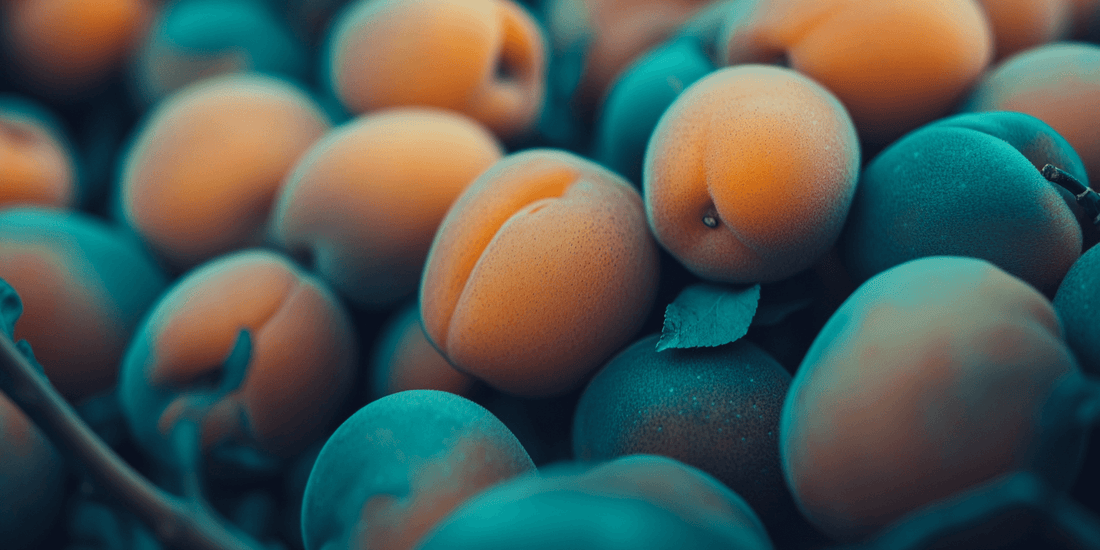Pile of pale orange apricots