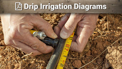 Hands measuring black poly tubing beside a drip fitting