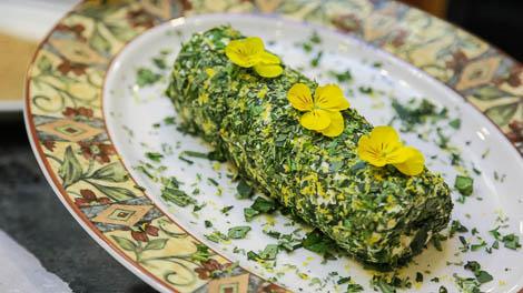 Herbed goat cheese garnished with yellow flowers