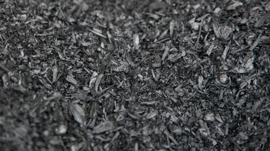 Close-up of black biochar pieces