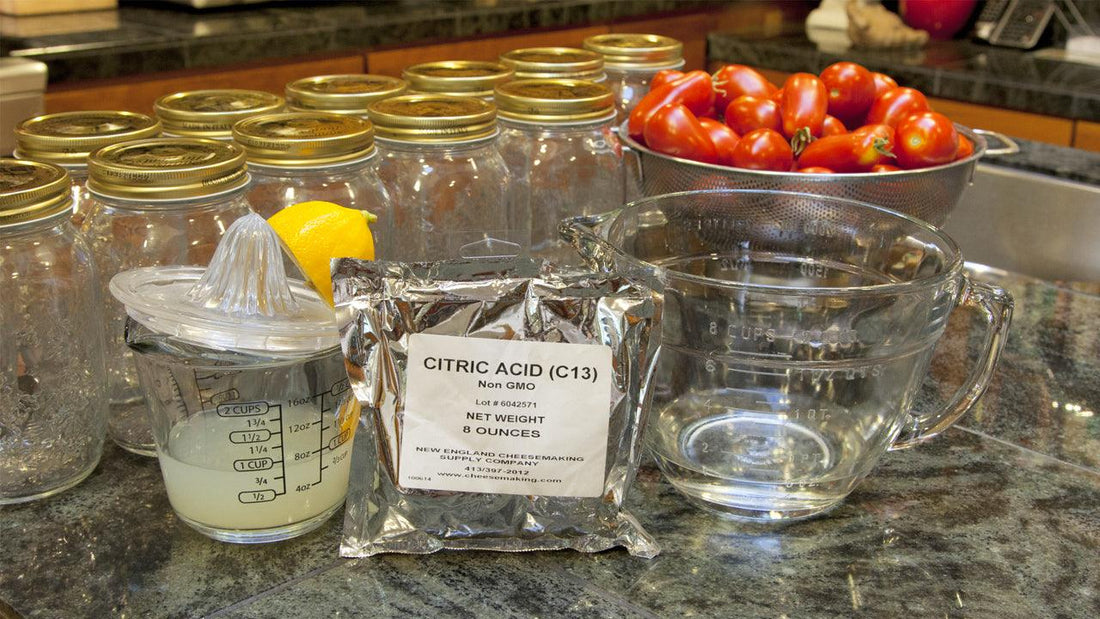 Canning jars and supplies arranged on a kitchen counter