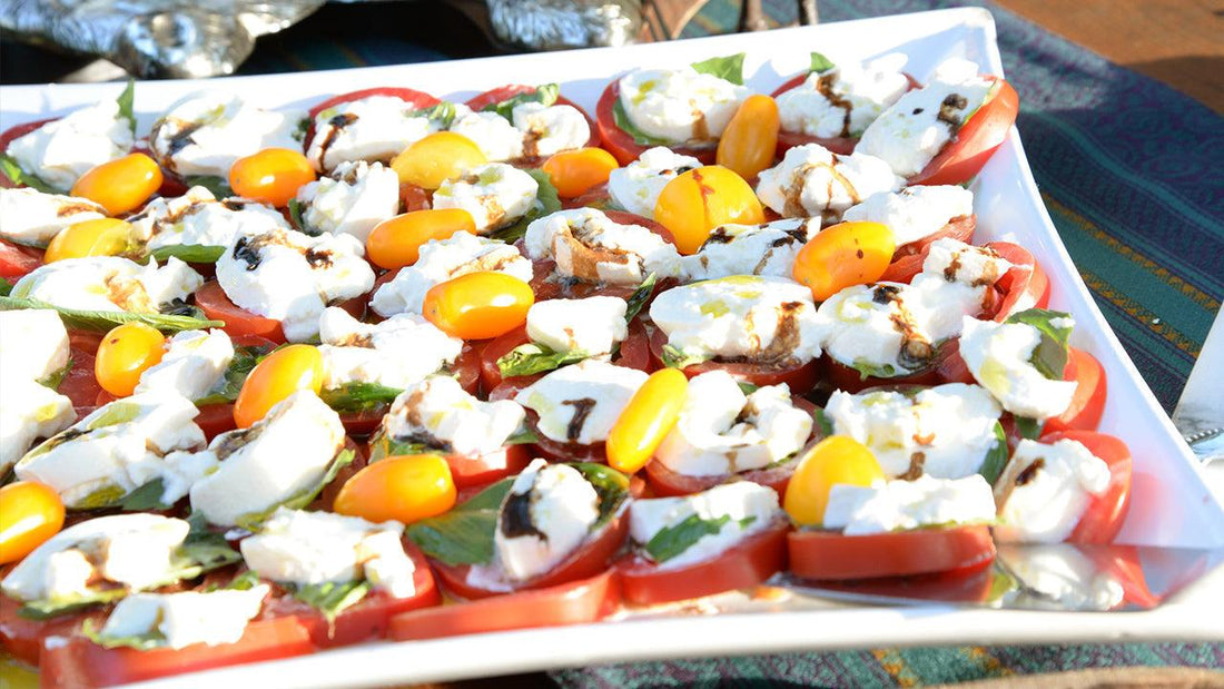 Tray of tomato, mozzarella, and basil caprese salad