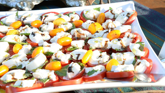 Tray of tomato, mozzarella, and basil caprese salad