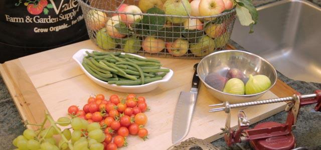Fresh produce and food-drying tools on a table