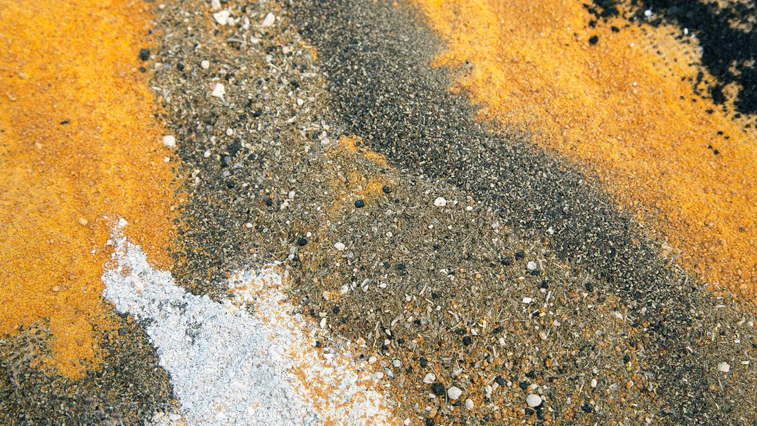 Bands of granular and powdered fertilizers