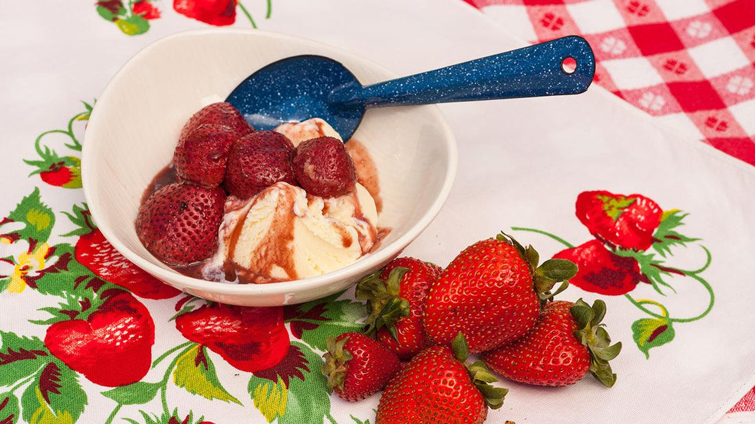 Vanilla-roasted strawberries over ice cream