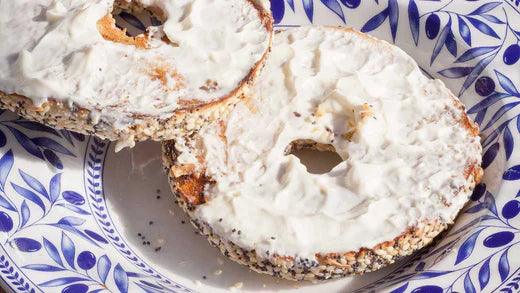 Round disk of yogurt cheese on a blue-and-white plate