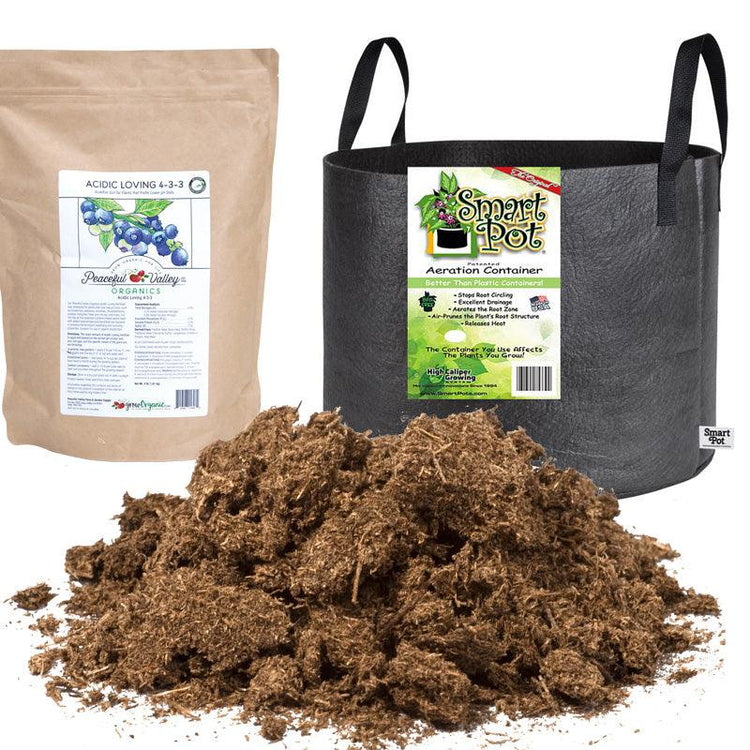Blueberry planting mix beside a fabric grow bag