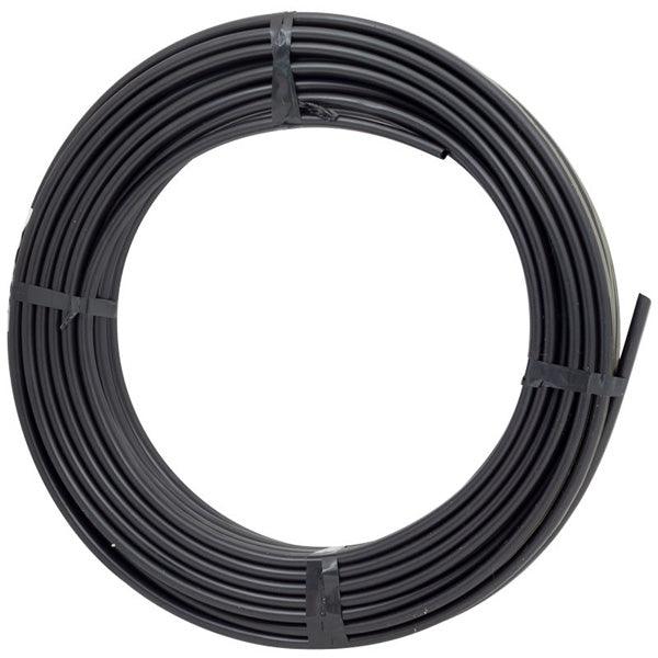 Coil of black emitterline irrigation tubing