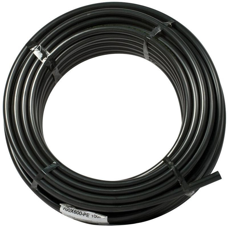 Coil of black polyethylene irrigation tubing