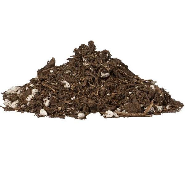 Mound of coarse brown growing medium