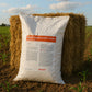Brandt Manganese Sulfate 50 lbs in a white bag in a field