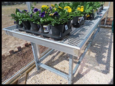 Janco greenhouse plant bench with expanded metal top