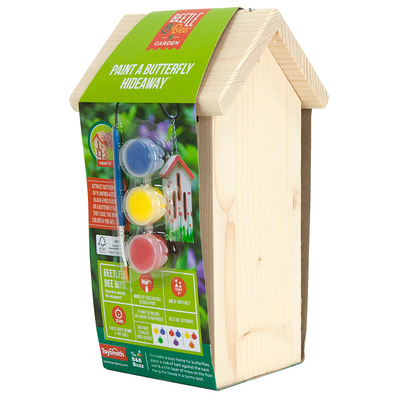 Beetle & Bee Garden Paint a Butterfly Hideaway made of wood and includes a paintbrush and paints attached to paper packagingon a white background.